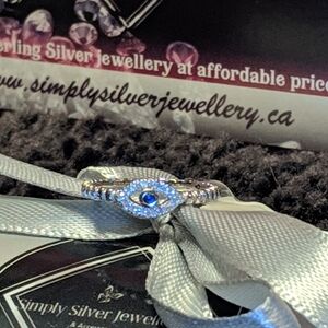 Twist Design Sterling Silver Ring with Crystals